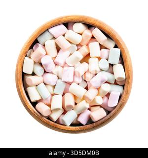 Mini marshmallow multicolore, in recipiente di legno. Pezzetti di dolciumi color pastello a base di zucchero, acqua e gelatina. Foto Stock