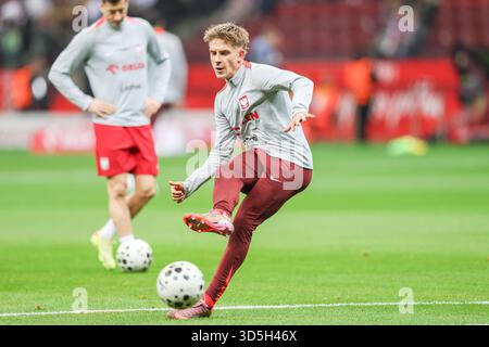 Varsavia, Polonia. 14 novembre 2025. Michal Skoras della Polonia visto in azione durante il warum-up prima della partita Polonia - Paesi Bassi nella Coppa del mondo di qualificazione europea 2026 allo stadio PEG Narodowy. (Foto di Grzegorz Wajda/SOPA Images/Sipa USA) credito: SIPA USA/Alamy Live News Foto Stock