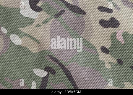 Primo piano in tessuto mimetico multicam a forza armata Foto Stock