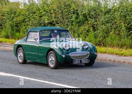 Anni '1959 50: Green Austin Healey cabriolet; Austin-Healey Sprite Mk1, affettuosamente conosciuta come "Frogeye" nel Regno Unito o "Bugeye" negli Stati Uniti, una classica auto sportiva britannica prodotta dal 1958 al 1961. Foto Stock