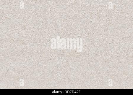 Consistenza uniforme di calcare beige chiaro o arenaria. Presenta una composizione fine con un aspetto generale pallido, ideale per applicazioni architettoniche Foto Stock