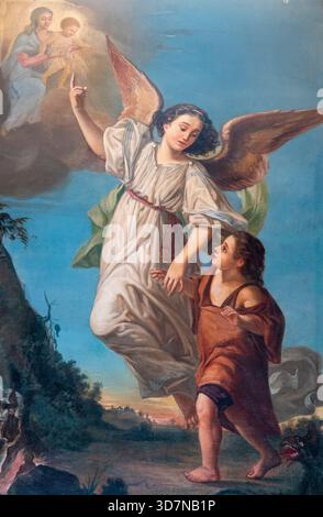 Cherasco, Italia - 10-20-2025: Pittura (XIX secolo) di angelo custode che protegge un bambino. Foto Stock