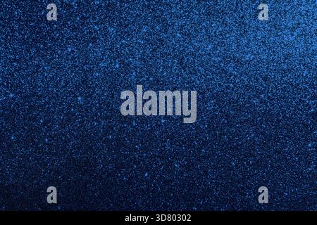 Sfondo blu con texture glitter con scintillanti e superficie scintillante per progetti di design Foto Stock