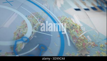 Versamento di due provette in vetro trasparente che rilasciano coriandoli multicolore su un piano da studio lucido, con HUD Foto Stock