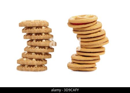 Due pile di biscotti diversi. Sfondo bianco Foto Stock