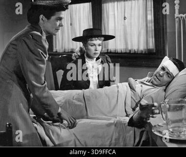 LA SQUADRA VINCENTE 1952 Warner Bros. Film con da sinistra: Dorothy Adams, Doris Day, Ronald Reagan Foto Stock