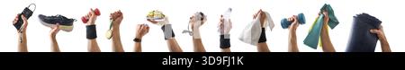 Sfondo di una collezione di mani che tengono gli accessori sportivi isolati su uno sfondo bianco. Foto Stock