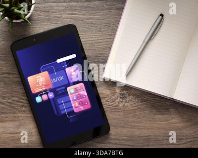Tablet che mostra gli elementi di sviluppo delle app e di progettazione dell'interfaccia utente su uno spazio di lavoro in legno con un notebook e una penna Foto Stock
