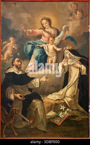 POSITANO, ITALIA - 7 OTTOBRE 2025: Il dipinto della Madonna con San Domenico e Santa Rosa di Lima nella Cattedrale di Santa Maria Assunta Foto Stock