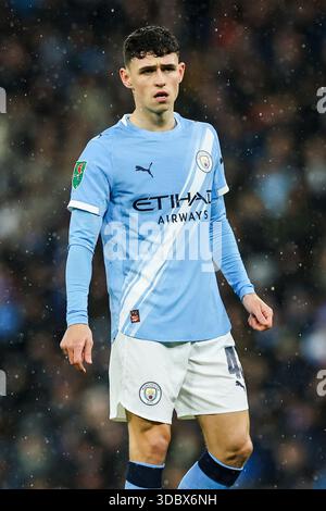 Manchester, Regno Unito. 17 dicembre 2025. Phil Foden (47), centrocampista del Manchester City contro Brentford Carabao Cup, il 17 dicembre 2025, all'Etihad Stadium di Manchester, Inghilterra Credit: Phil Duncan/Every Second Media Credit: Every Second Media/Alamy Live News Foto Stock