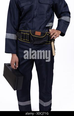 Primo piano della cintura manuale con attrezzi e cassetta degli attrezzi nera. Foto Stock