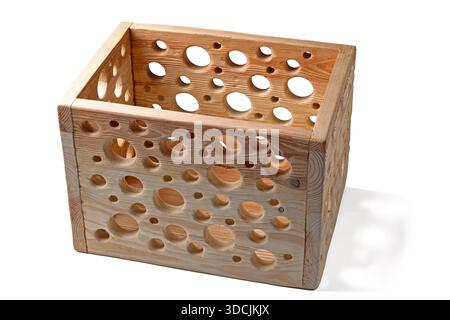 Cassetta per utensili in legno con fori rotondi isolata su sfondo bianco. Foto Stock