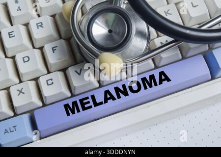 Pulsante melanoma sulla tastiera Foto Stock