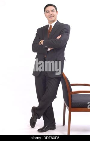 Young Asian executive full length portrait, USA Foto Stock