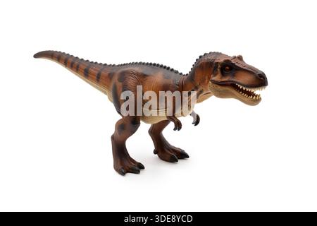 Feroci dinosauri carnivori isolati su sfondo bianco, che mostrano texture dettagliate e pose minacciose di predatori preistorici. Foto Stock