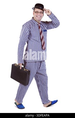 Uomo in pigiama con valigia Foto Stock