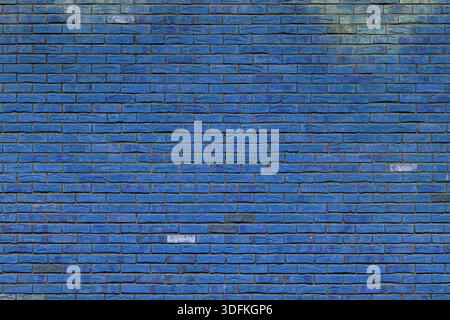 Vecchio muro di mattoni blu. Sfondo interno astratto. Foto Stock
