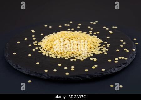 Primo piano di pasta secca a stella stellata. Concetto World Paste Day. Foto Stock