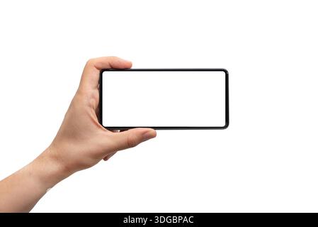Man mano che tiene nero smartphone isolati su sfondo bianco Foto Stock