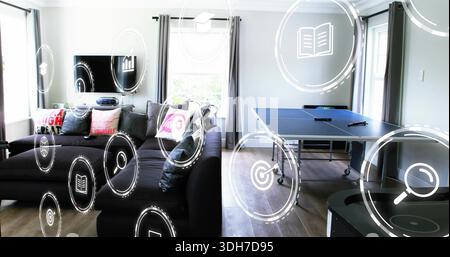 Mostra il divano a sezione a L nero che occupa la sinistra del soggiorno, il tavolo da ping pong e le icone HUD Foto Stock
