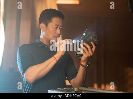 The Meg 2: The Trench (2023) Wu Jing nel ruolo di Jiuming *Filmstill - solo uso editoriale* CAP/PLF Warner Bros/fornito da Capital Pictures Foto Stock