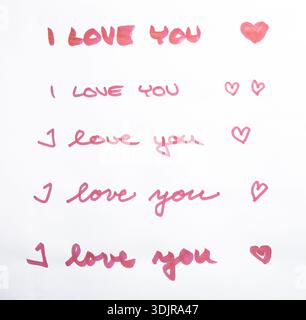 Ti amo. Lettere scritte a mano su carta bianca. Foto Stock