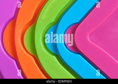 Sfondo macro astratto di superfici plastiche colorate e linee geometriche Foto Stock