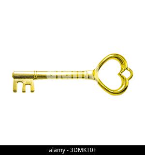Chiave d'oro vintage, testa ad anello a forma di cuore, antico simbolo di accesso e sicurezza. Foto Stock