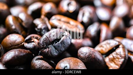 Close up di chicchi di caffè tostati. Foto Stock