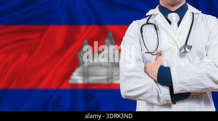 Medico maschile con stetoscopio sulla bandiera della Cambogia. Medico con stetoscopio sulla bandiera della Cambogia Foto Stock