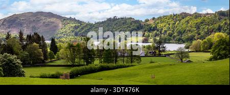 vista panoramica del lago grasmere dalla riva di allan nelle giornate di sole primaverili non c'è gente Foto Stock