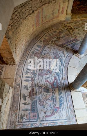 I mosaici mostrano la vita quotidiana e le attività nell'antichità romana a Villa Romana del Casale in Sicilia, Italia. Foto Stock