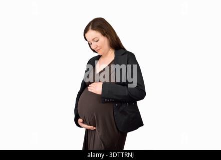 Ritratto di una donna d'affari incinta con sfondo bianco Foto Stock