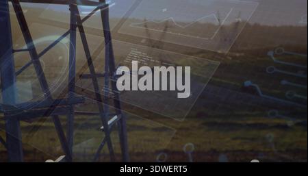 La torre reticolare che inquadra a sinistra nei campi, mostra sovrapposizioni HUD e linee di alimentazione, spazio di copia Foto Stock