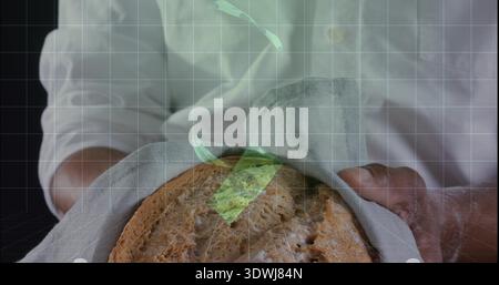 Cullino di un adulto con un pane rustico in lino in cucina con maniche in camicia con bottoni bianchi Foto Stock