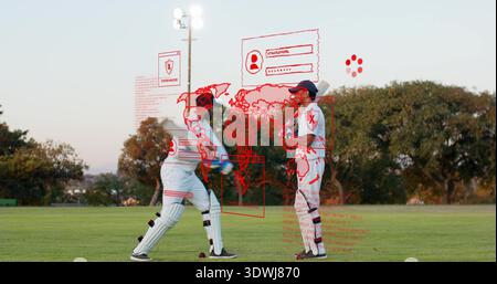Due giocatori di cricket che indossano tamponi e guanti bianchi, tengono i pipistrelli all'esterno, con sovrapposizioni rosse Foto Stock