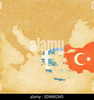 Grecia e Turchia colorate con la bandiera su una mappa ocra retrò dei Balcani su carta d'epoca. Foto Stock