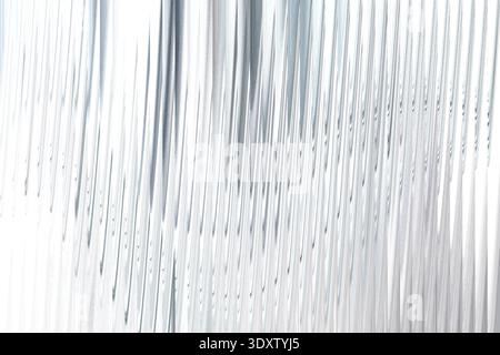 Immagine astratta con linee bianche e grigie che creano un design di composizione dinamico e uniforme Foto Stock