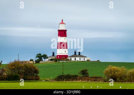Faro di Happisburgh, North Norfolk. L'unico faro di proprietà indipendente in Gran Bretagna, anche il più antico faro funzionante nell'East Anglia. Foto Stock