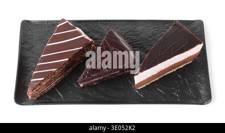 Pezzi di vari tipi di torte isolati su bianco Foto Stock