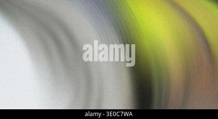 Un'immagine con sfondo astratto sfocato con sfumature di grigio, verde e giallo che creano un effetto fluido e fluido. Foto Stock