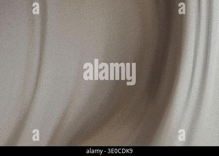 Uno scatto dettagliato in primo piano rivela la texture sottile e le pieghe di un tessuto beige chiaro. L'immagine mostra il telo morbido e le sottili variazioni del Foto Stock