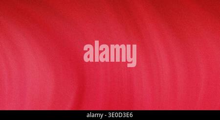 Un'immagine sfocata con sfumature di rosso uniformi. La texture è morbida e il colore è uniforme ovunque. Foto Stock
