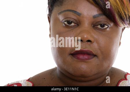 Close up di grasso nero donna africana Foto Stock