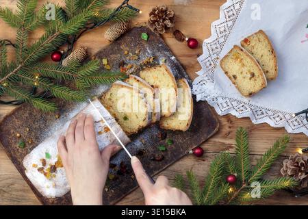 Famosa taglierà a pezzi la torta di Natale Foto Stock