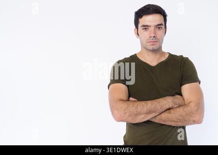 Foto in studio di un giovane bellissimo persiano isolato su sfondo bianco Foto Stock