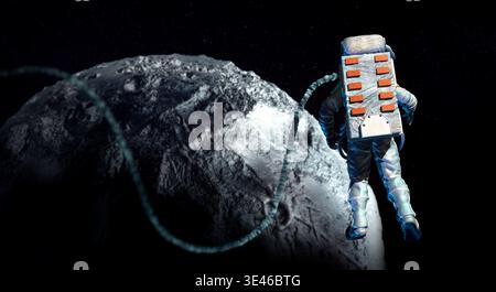 Astronauta che indossa una tuta speciale contro il corpo celeste nello spazio Foto Stock