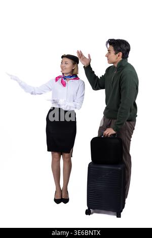 Giovane coppia con valigia in preparazione per un viaggio o un viaggio Foto Stock