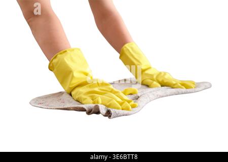 Donna che pulisce la superficie con un panno indossando un guanto di gomma giallo. Lavoratore domestico che esegue lavori domestici. Igiene, igienizzazione, manutenzione e. Foto Stock