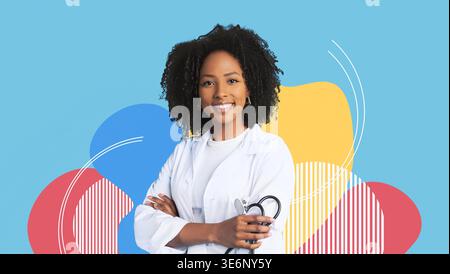 Giovane dentista afroamericana in accappatoio bianco con stetoscopio in posa in Studio Foto Stock